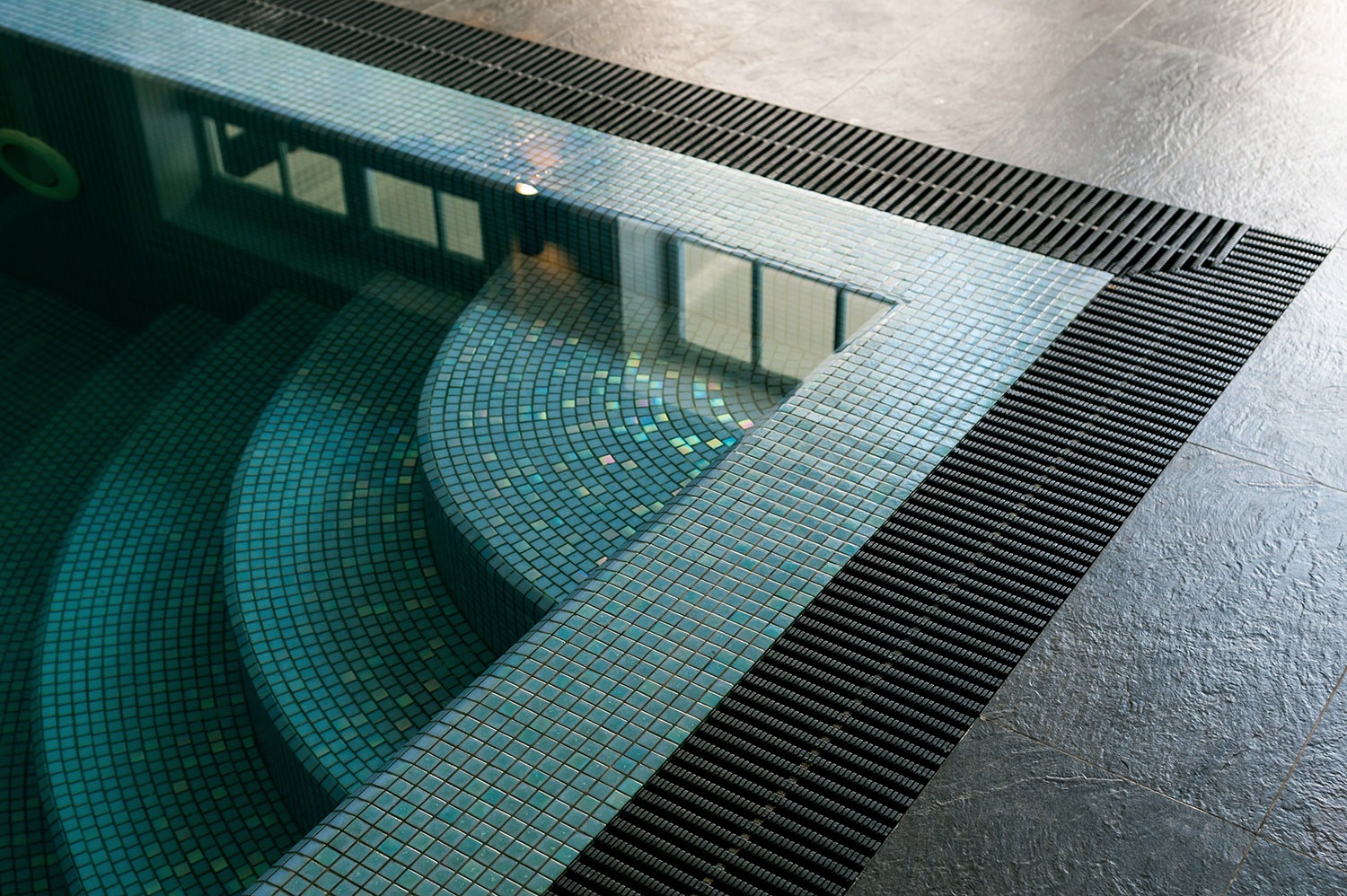 Corner of pool with tile steps